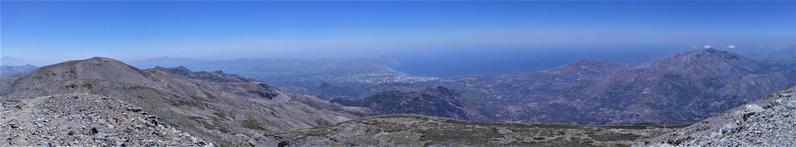 Panorama from Mount Psiloritis (Timios Stavros peak), Crete, Greece, to the south. In the middle: Tympaki town and Messara Gulf. On the right: Mount Kentros (Kedros).
